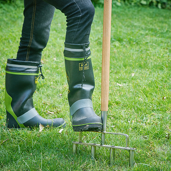 Stainless Steel 4 Prong Lawn Aerator In-Use Image Stainless Steel 4 Prong Lawn Aerator - Image 3
